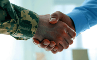 Military-civilian handshake on job search